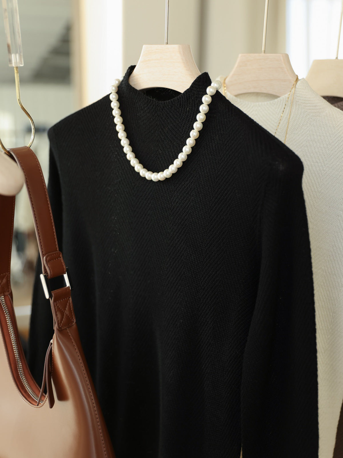 Machine washable 60 ultra-fine worsted full wool sweaters with fish bone pattern and thin seamless long-sleeved knitted sweaters and tops for women's autumn and winter