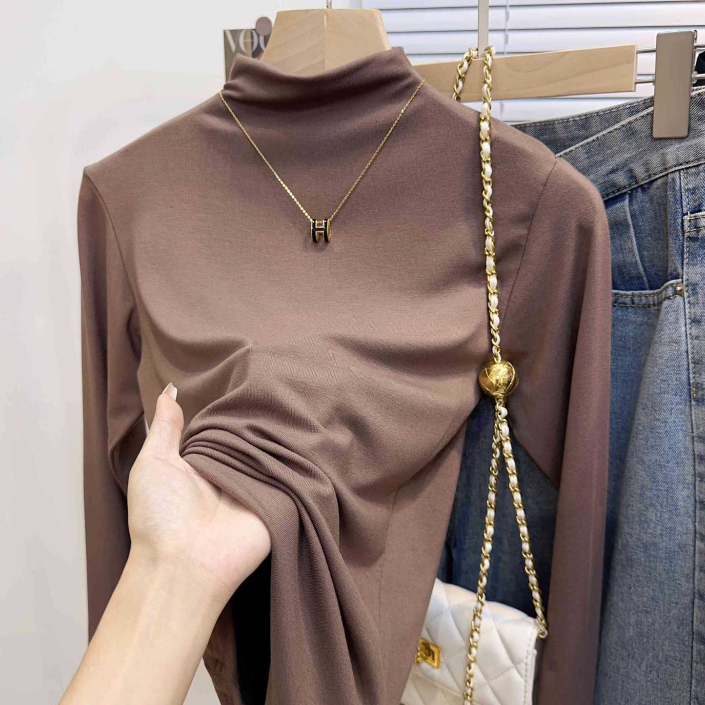 Semi-turtleneck bottoming shirt women's 2025 new autumn and winter inner threaded fashionable foreign style long-sleeved knitted beautiful top