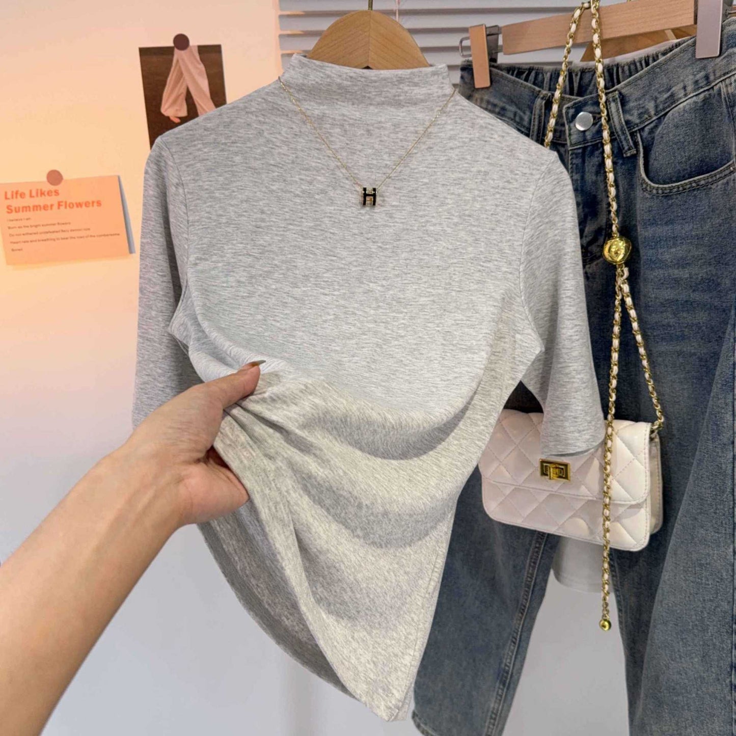 Semi-turtleneck medium-sleeved T-shirt women's spring and autumn new black five-quarter-sleeved versatile fashionable foreign-style top bottoming shirt