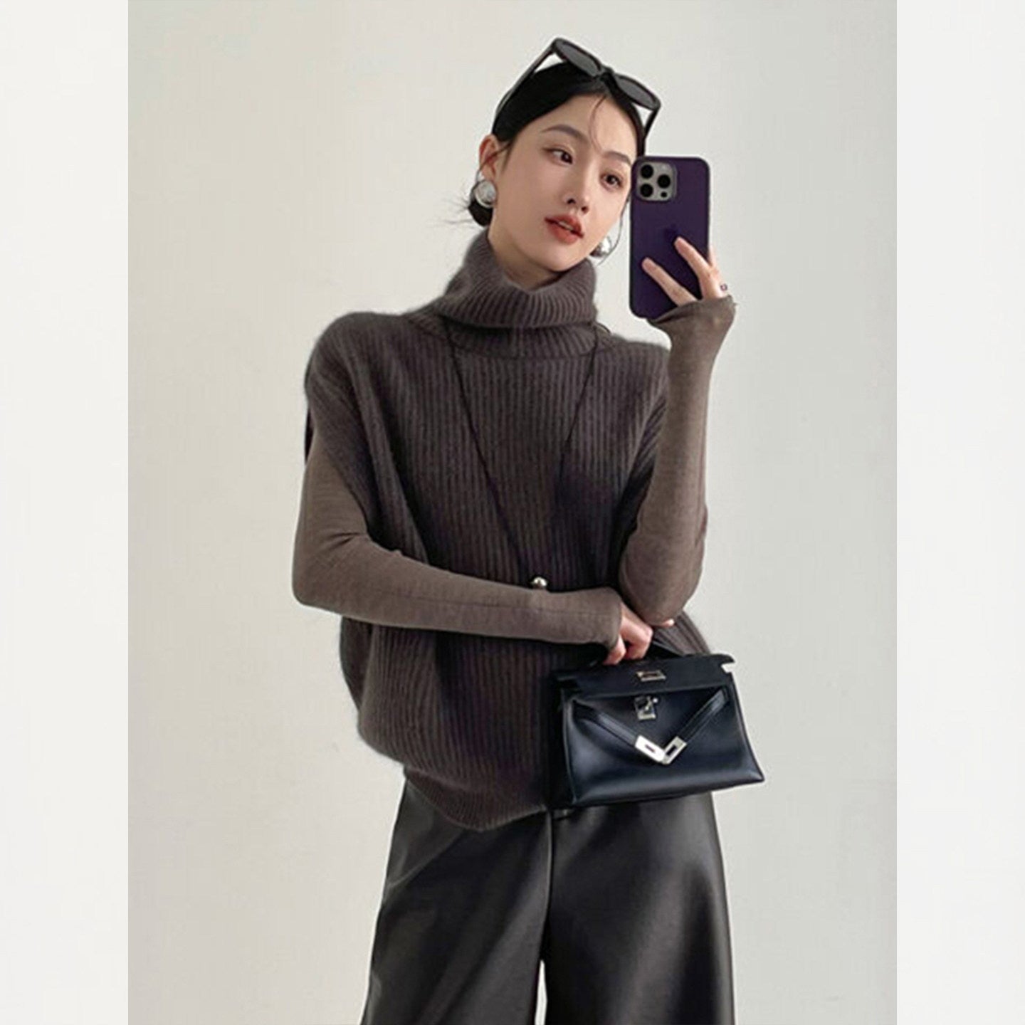 Fashionable foreign style turtleneck sleeveless knitted vest women's autumn and winter loose lazy wind stacked sweater top