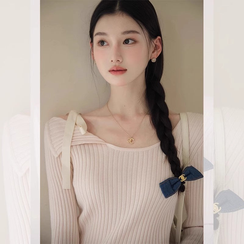 Pink irregular one-word shoulder long-sleeved knitted sweater women's spring and autumn short bottoming shirt temperament with split top