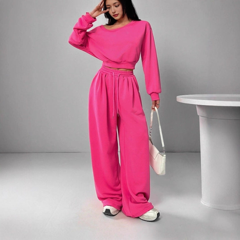 Spot European and American casual suit solid color sweater women's one-word collar off-shoulder loose knitted short long-sleeved suit