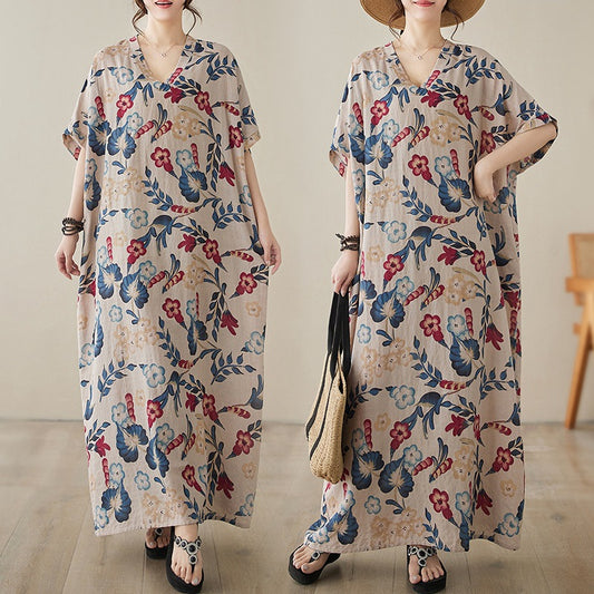 The real shot is the new V-neck cotton and linen large size loose literary and retro holiday wind beach dress for women in the summer of 2024.