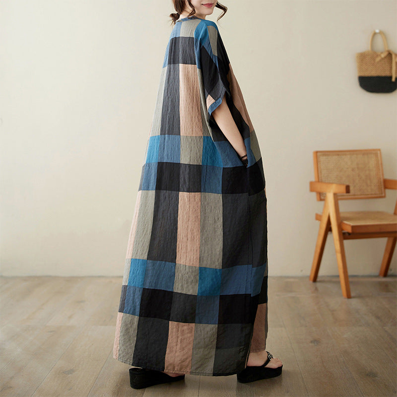 Real shot 2024 summer V-neck cotton and linen large size loose literary holiday wind beach skirt retro long robe woman