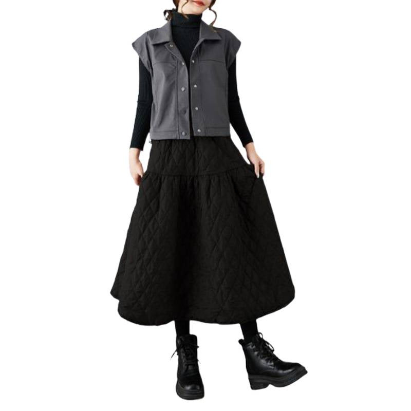 The real shot will be in the autumn and winter of 2025. The new cotton-added warm and thin solid-color A-shaped skirt women's clothing.