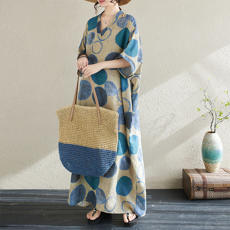 The real shot of the new summer of 2024 is a holiday style travel V-neck retro long dress covering the meat cotton and linen dress for women