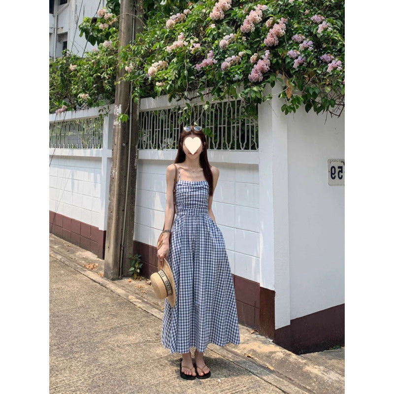 French dopamine high sense and thin Sanya vacation beach skirt temperament waist plaid suspender seaside dress