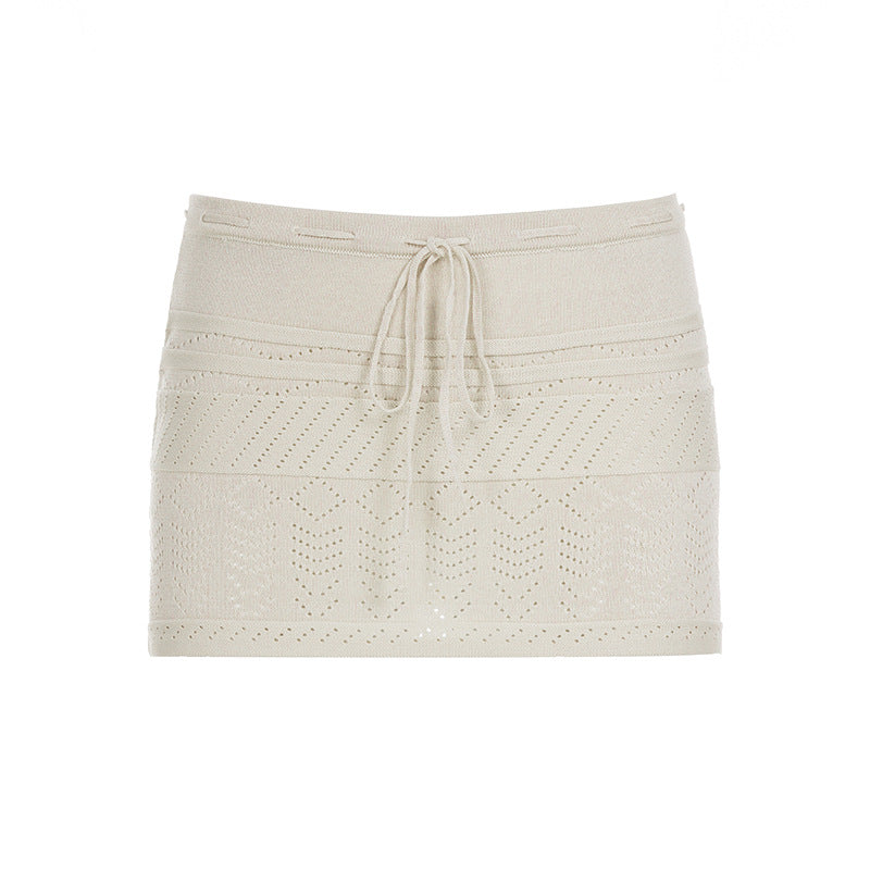 2025 autumn new product hollow woolen crochet A-shaped skirt niche pure desire gentle wind exposed navel low waist lace-up short skirt