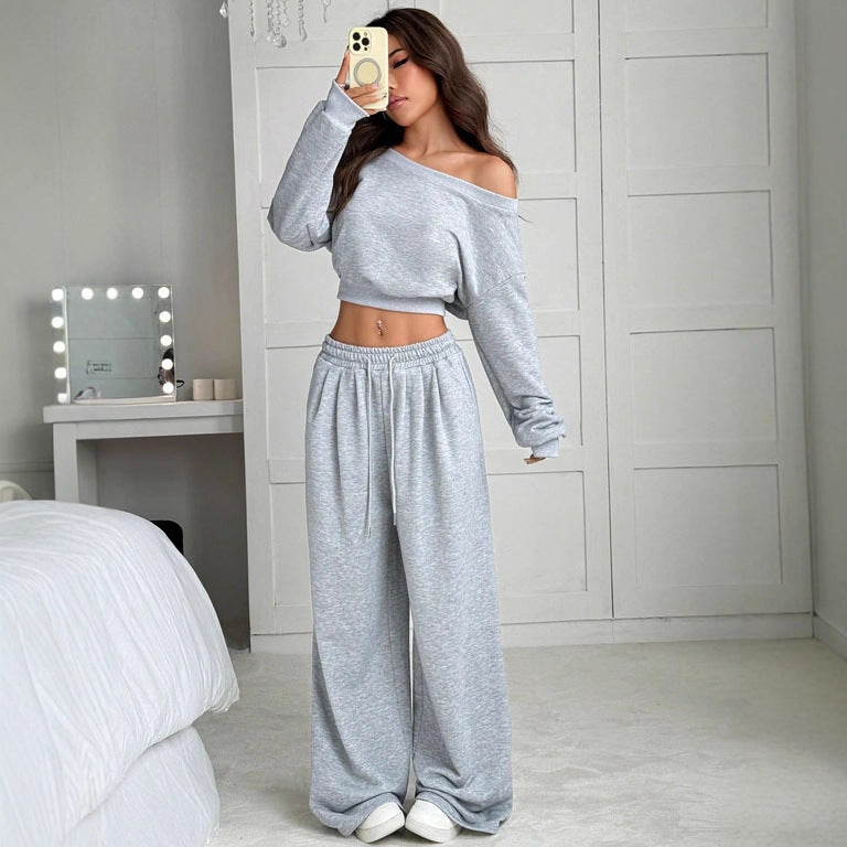 Spot European and American casual suit solid color sweater women's one-word collar off-shoulder loose knitted short long-sleeved suit