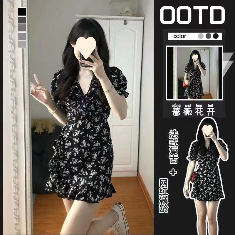 French short black floral dress, women's sweet and lustful skirt, puff sleeves, waist design, niche sense