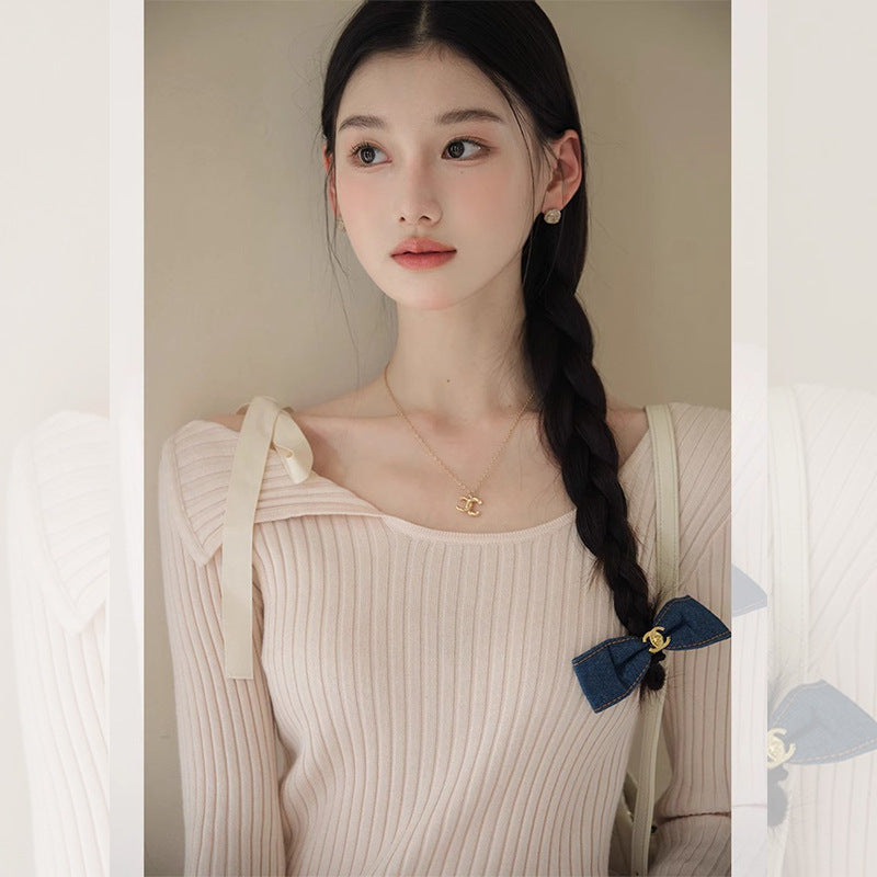 Pink irregular one-word shoulder long-sleeved knitted sweater women's spring and autumn short bottoming shirt temperament with split top