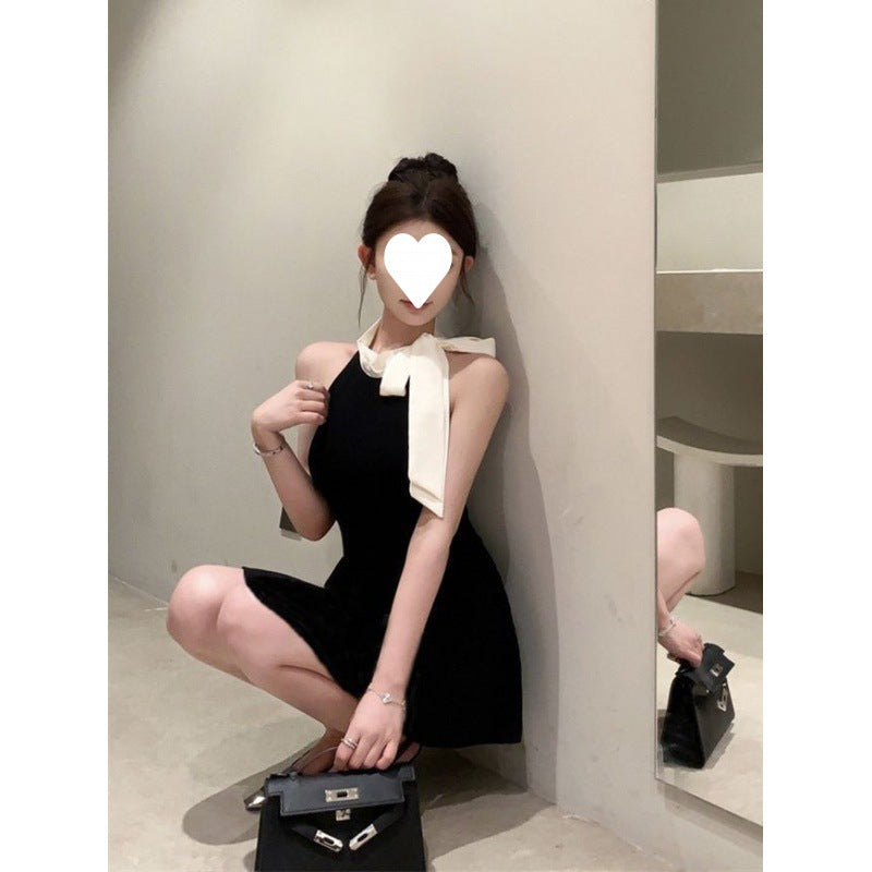 French black sleeveless dress women's summer new super fairy temperament bow slim short skirt waist small black dress