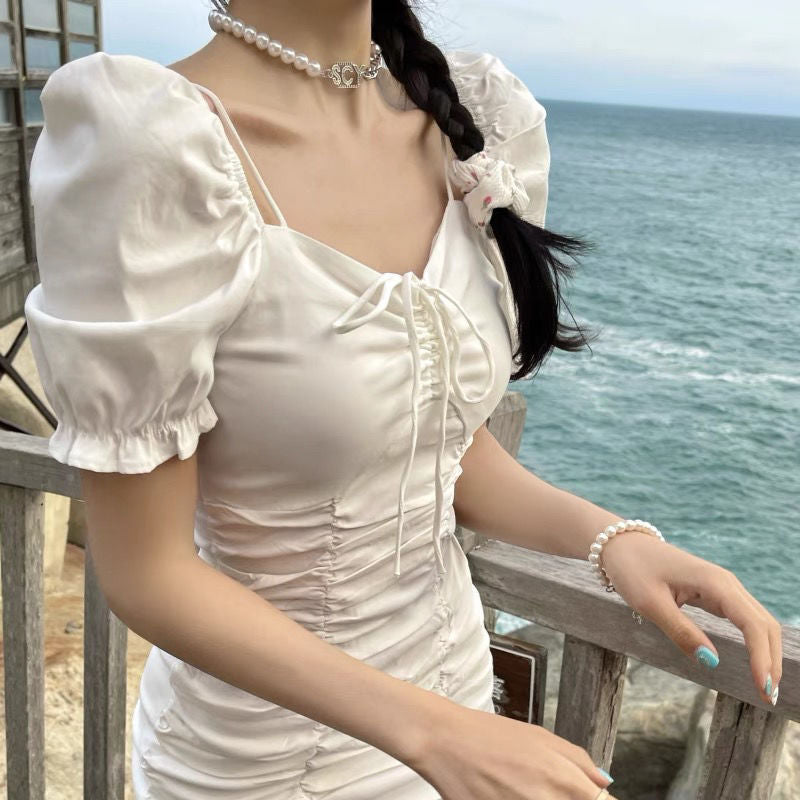 Summer 2025 new Korean version temperament French light ripe wind bubble sleeves pleated drawstring slim and thin dress women
