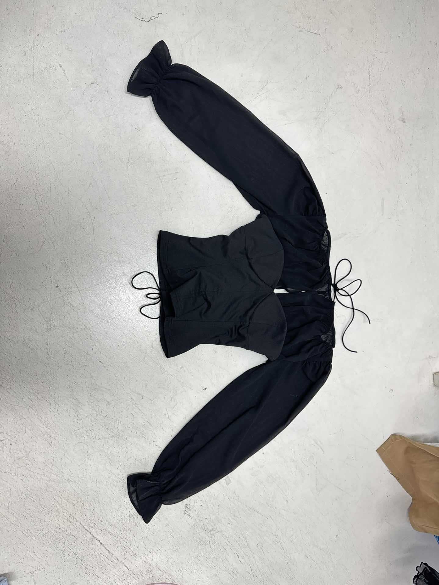 Niche design sense European and American temperament chiffon lantern sleeve top deep V-neck sexy waist short long-sleeved shirt women