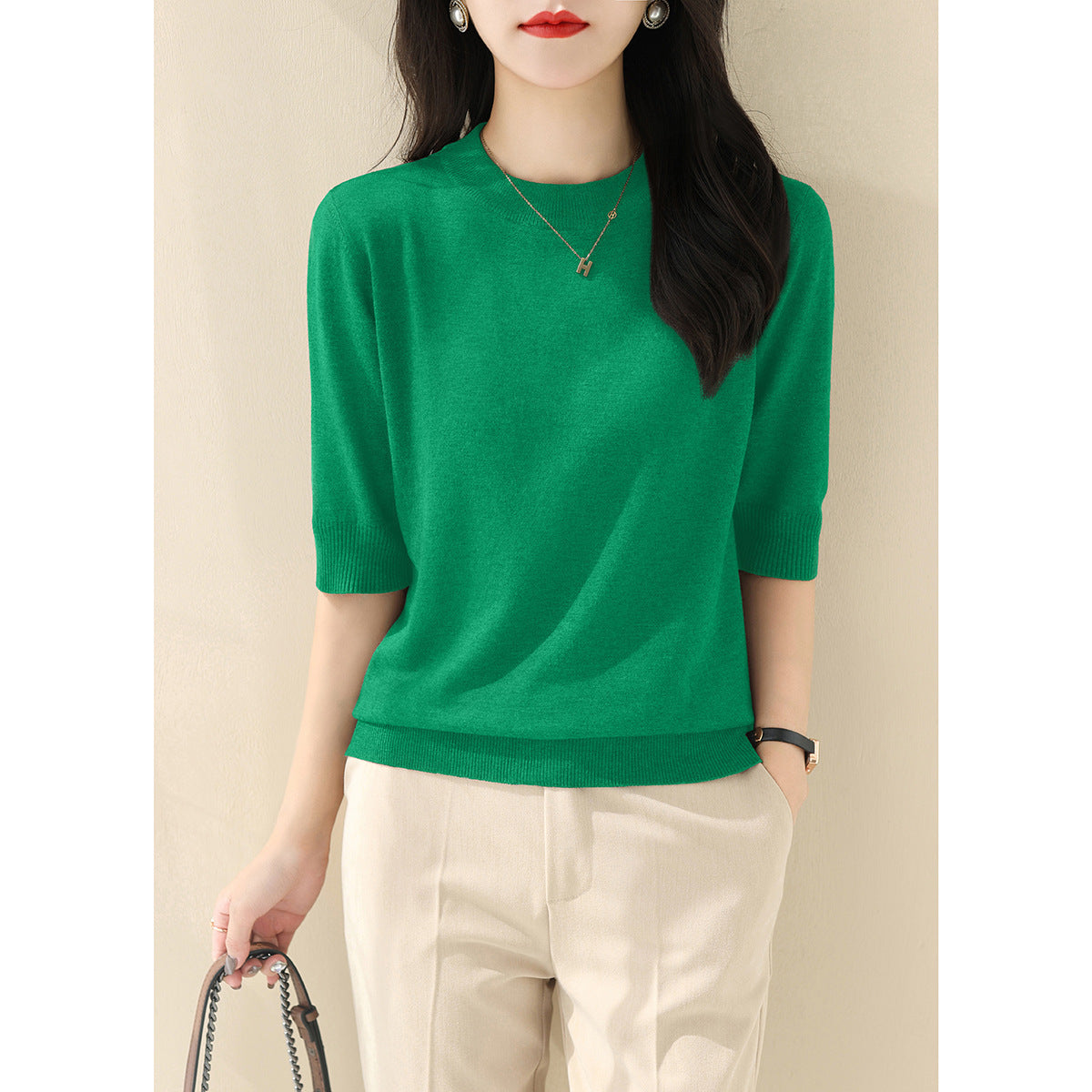 New solid color medium-sleeved temperament intellectual knitted sweater women's clothing 2025 summer half-height round neck five-quarter sleeve loose top