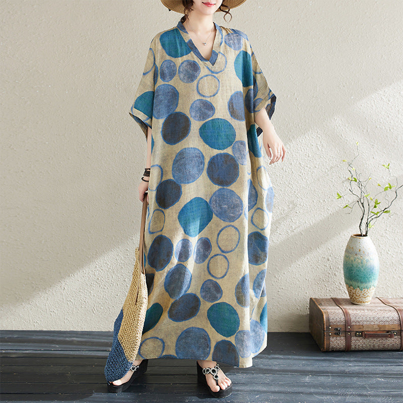 The real shot of the new summer of 2024 is a holiday style travel V-neck retro long dress covering the meat cotton and linen dress for women