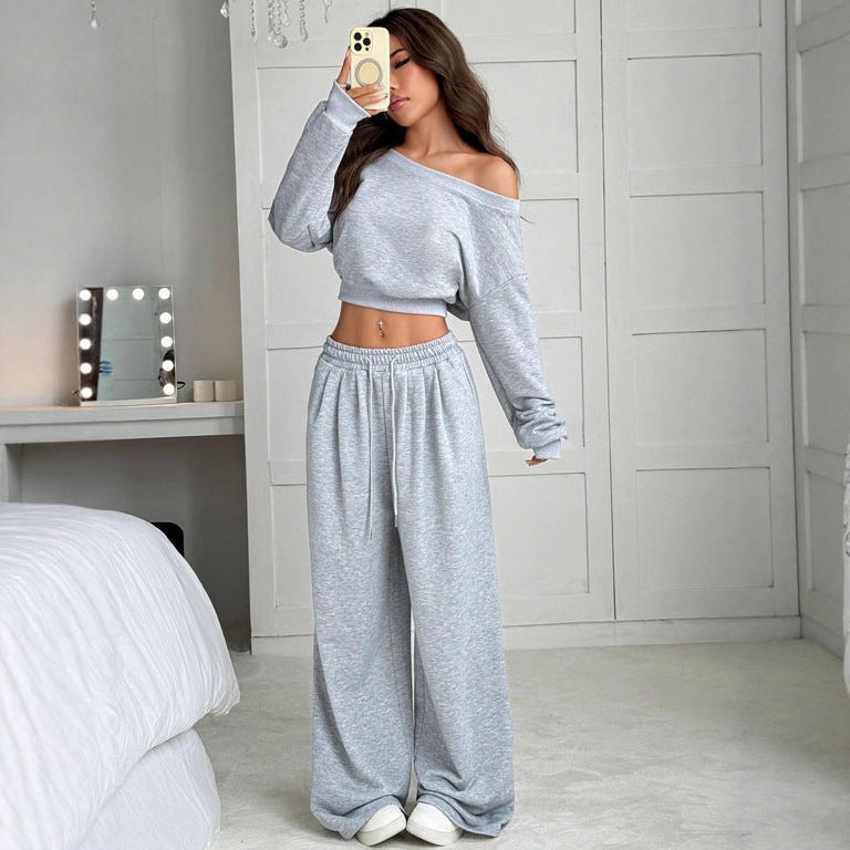 Spot European and American casual suit solid color sweater women's one-word collar off-shoulder loose knitted short long-sleeved suit