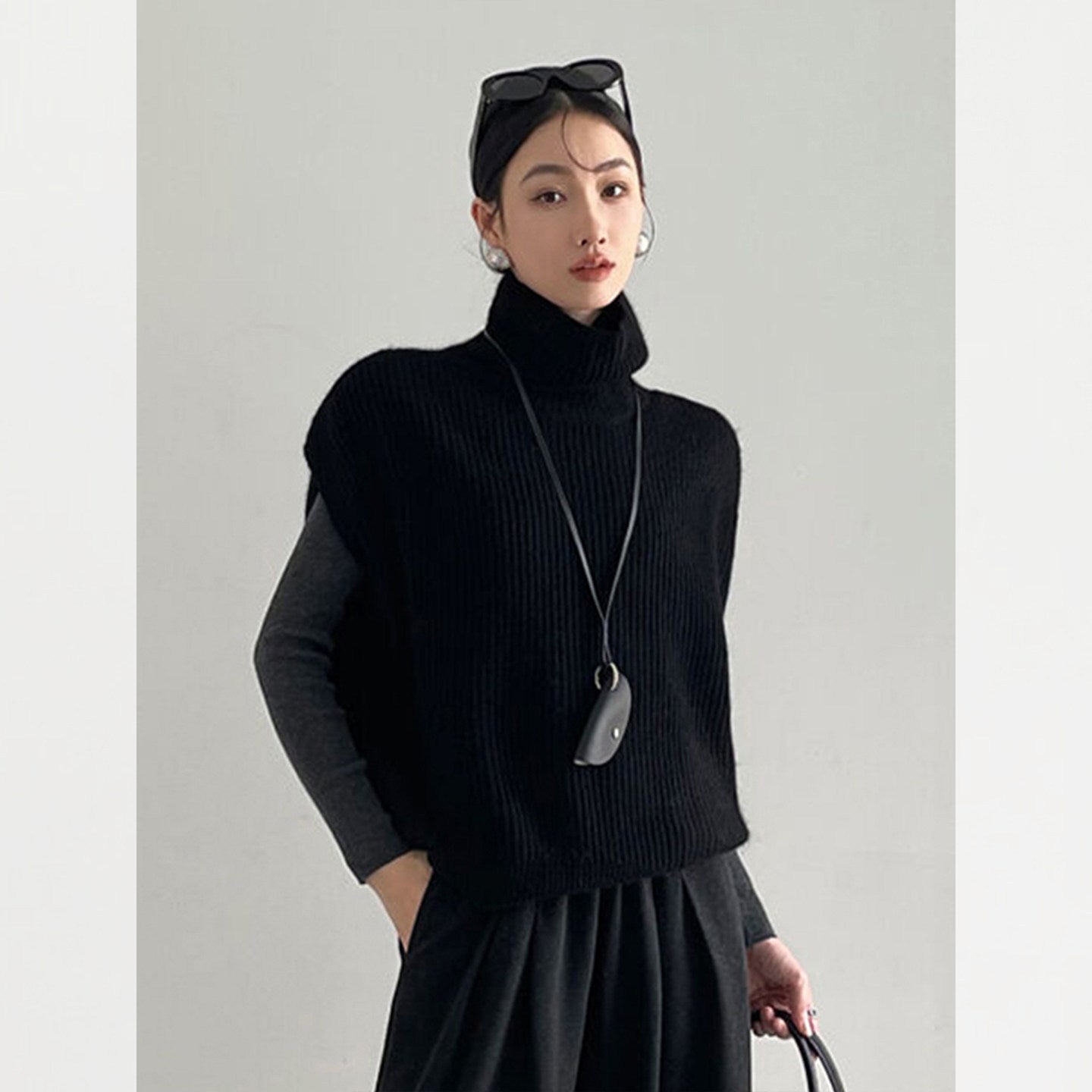 Fashionable foreign style turtleneck sleeveless knitted vest women's autumn and winter loose lazy wind stacked sweater top