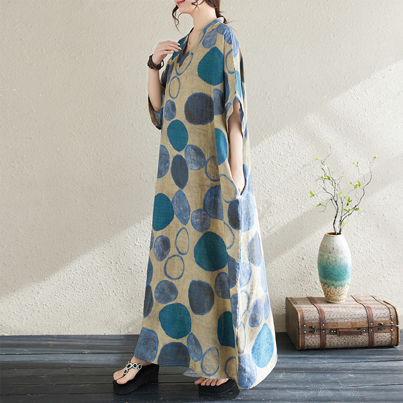 The real shot of the new summer of 2024 is a holiday style travel V-neck retro long dress covering the meat cotton and linen dress for women