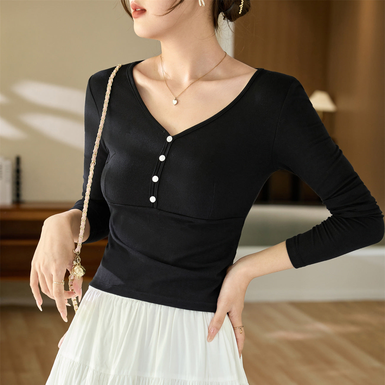 #Quality to do high quality #temperament age reduction design sense T-shirt women's long sleeves 2026 autumn clothes new shell buckle pure desire top