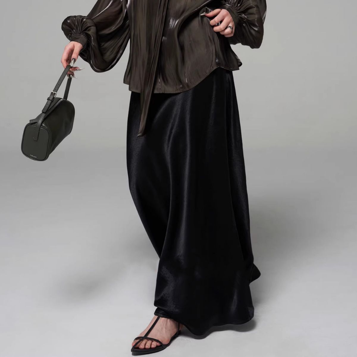 New Chinese light luxury 25 spring and summer new imported acetic acid Muse bi into super long mopping diagonal cut skirt women