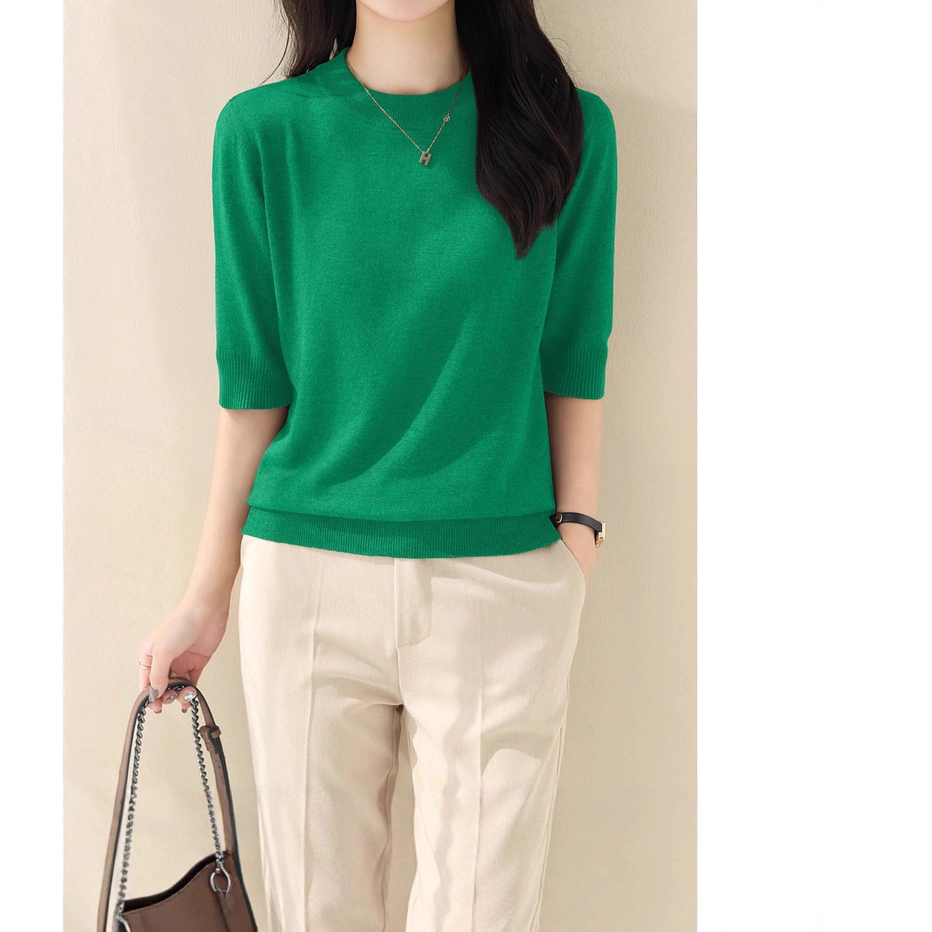 New solid color medium-sleeved temperament intellectual knitted sweater women's clothing 2025 summer half-height round neck five-quarter sleeve loose top