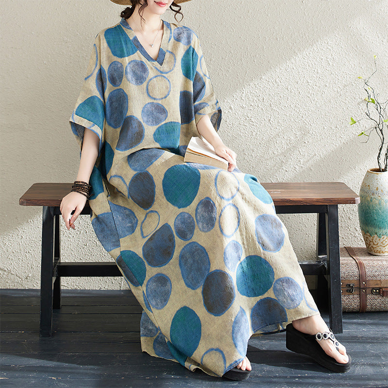 The real shot of the new summer of 2024 is a holiday style travel V-neck retro long dress covering the meat cotton and linen dress for women