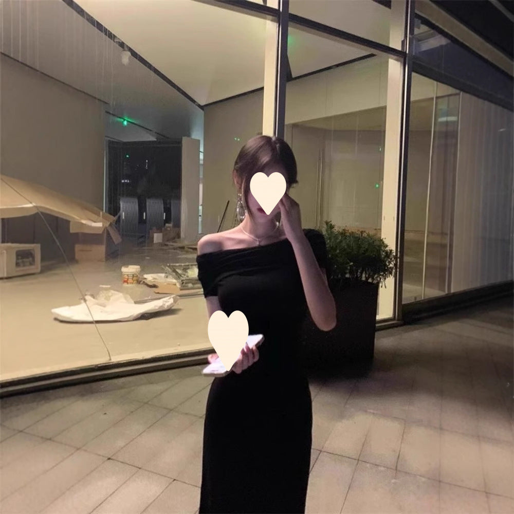 Gao Leng Yujie wore a black one-line neck dress, a woman's summer temperament, slim and slim, and a waist and hip length skirt